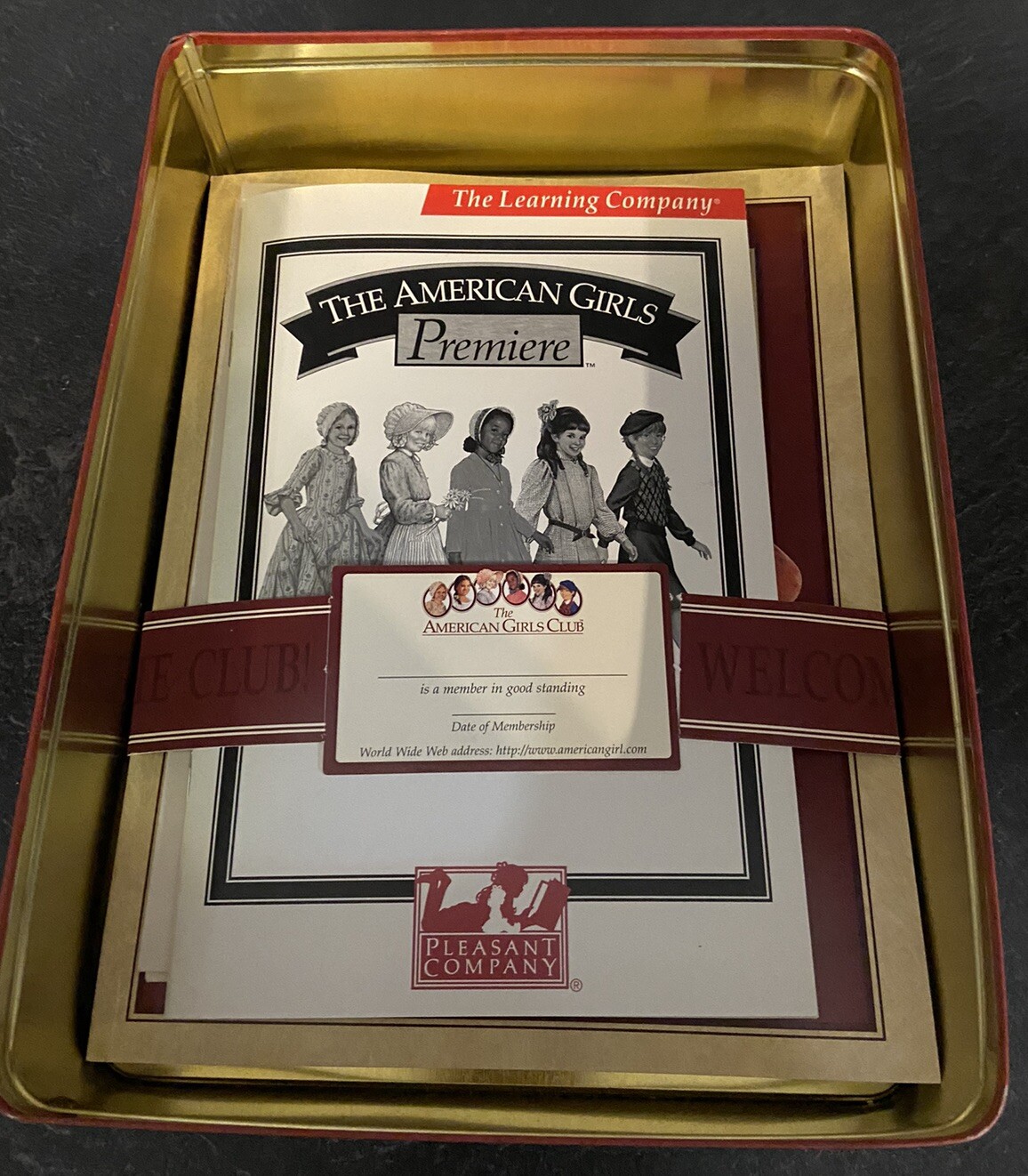 The American Girls Premiere Metal Tin With User Guide Handbook Hat CD & More
