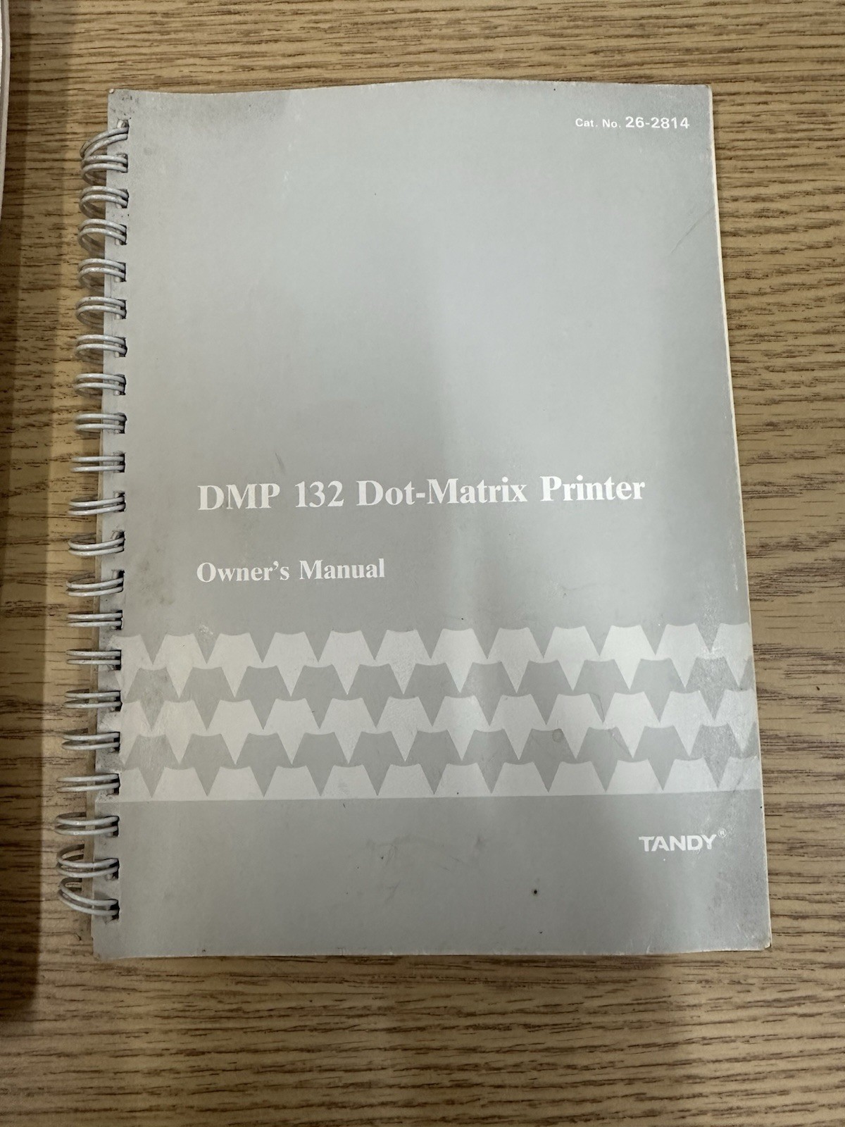 DeskMate TANDY USER REFERENCE MANUAL and DMP 132 Dot-Matrix Printer Manual.